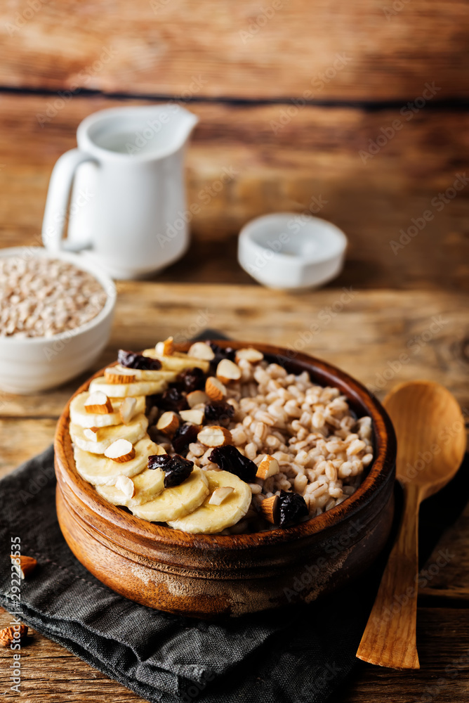Barley porridge with banana slices and almonds Barley porridge with banana slices and almonds