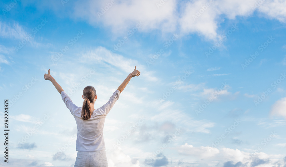 Happy woman outdoors living in a healthy state of mind Happy woman outdoors living in a healthy state of mind
