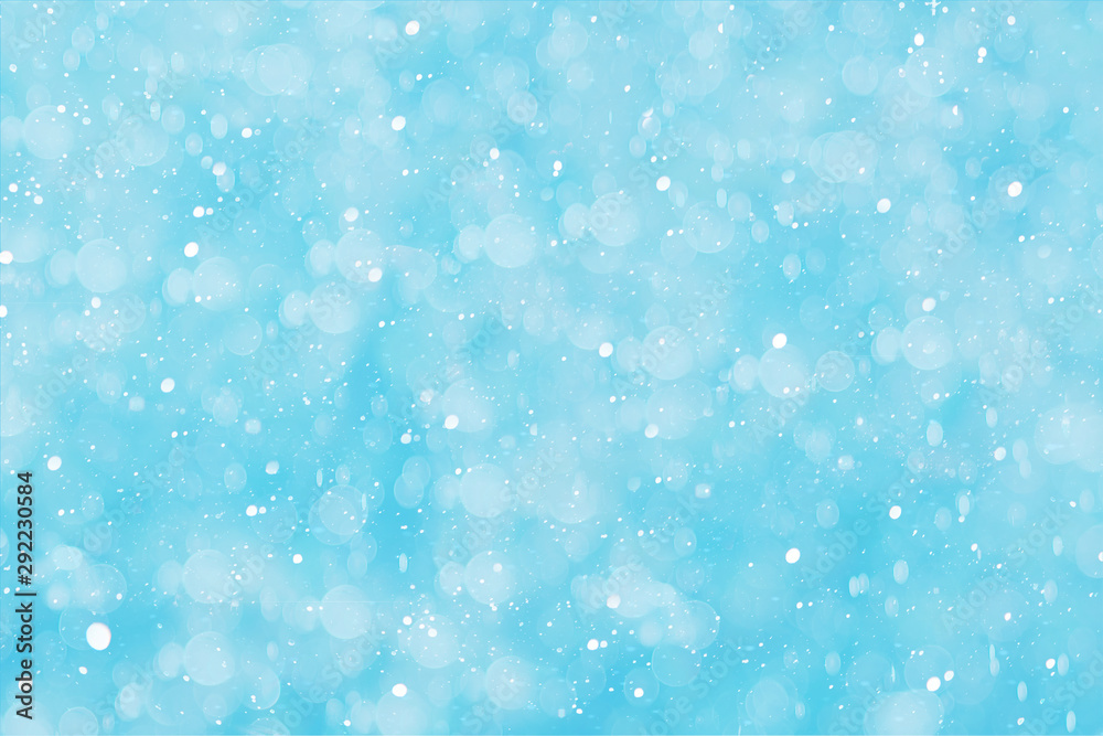 Obraz premium Christmas background, abstract blue background with bokeh and snowflakes. Winter banner for your text.