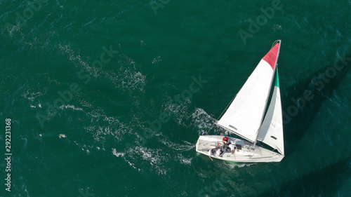 Aerial drone photo of white Sailing boats compete during sailing regatta practise in open ocean exotic sea