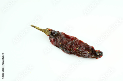 Chipotle Peppers (dried jalapeño, Capsicum annuum, Morita Variety), isolated on a white background photo