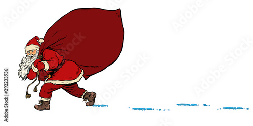 Santa with a bag of gifts. Christmas and New year