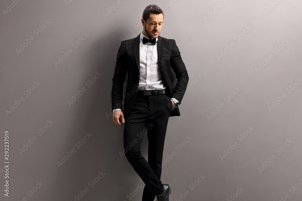 Man in a black suit and bow tie Man in a black suit and bow tie
