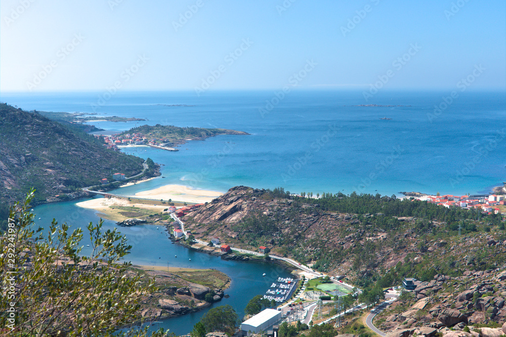 Port and mount of Pindo, in NW Spain. and of the river and a beach on the top of the image