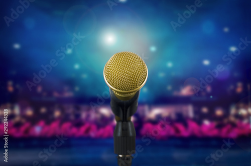 Gold microphone on stage during the concert