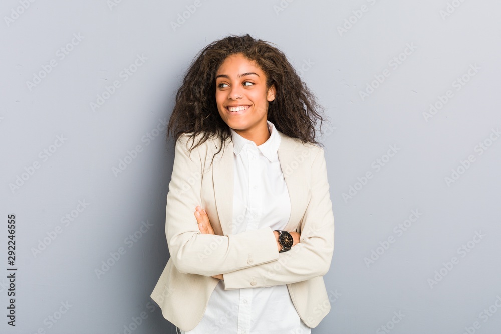 Young african american business woman smiling confident with crossed arms. Young african american business woman smiling confident with crossed arms.