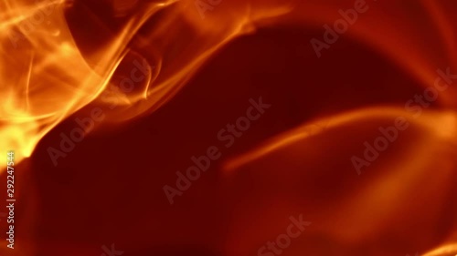 Flames. This video captures a tight shot of flames dispersing.