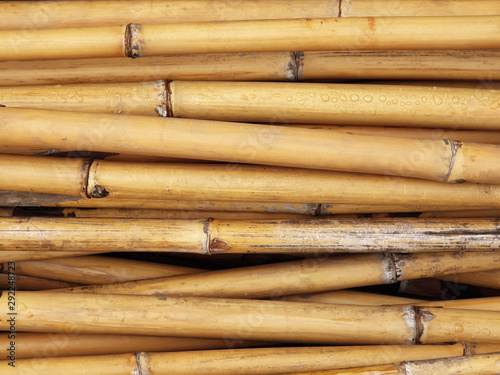 Bamboo wallpaper background.Long pieces of bamboo were laid horizontally. Stacks of wood