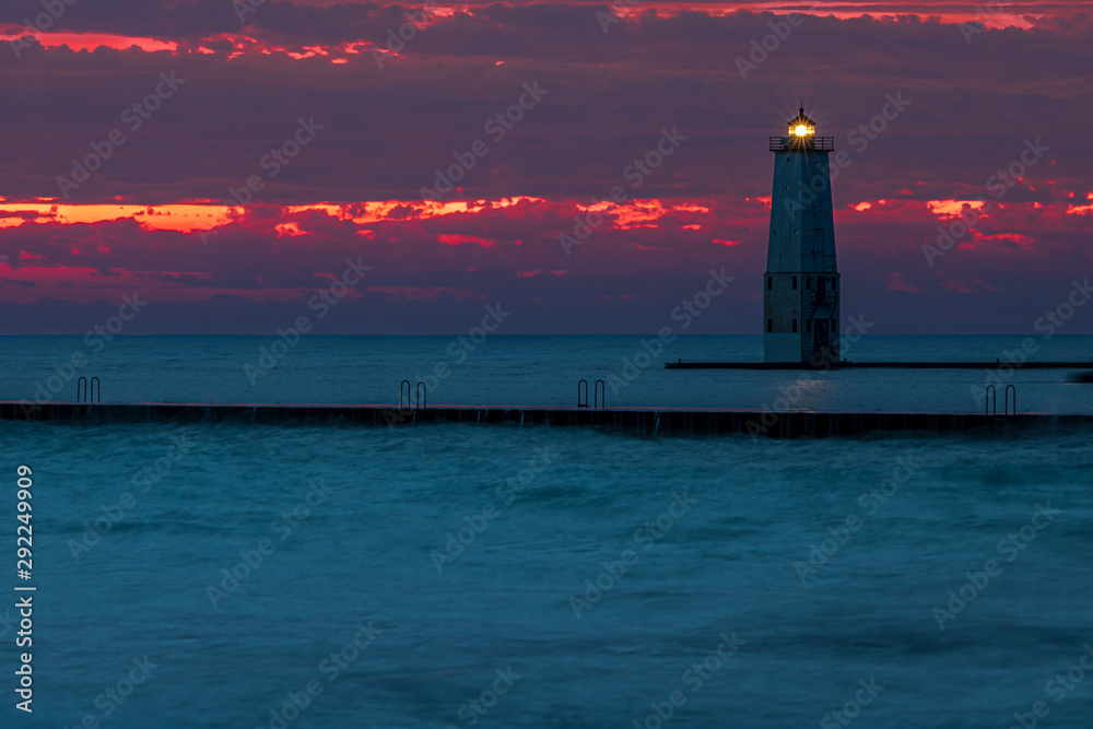 Lake Michigan lighthouse at sunset