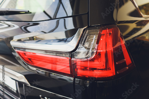 Car detail. New led taillight by night. The rear lights of the car, in hybrid sports car. Developed Car's rear brake light. photo