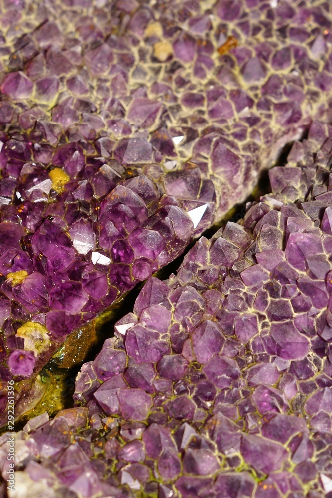 View of a purple amethyst crystal stone View of a purple amethyst crystal stone