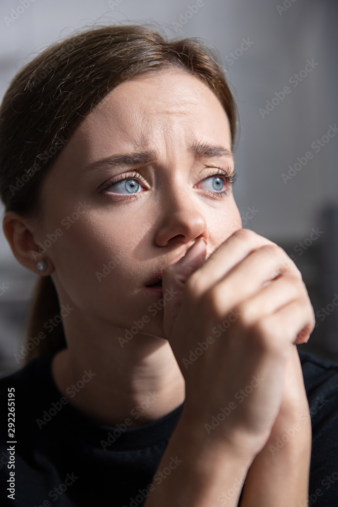beautiful upset young woman looking away at home beautiful upset young woman looking away at home