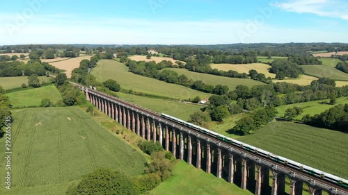 Aerial of Fast Train over the Ouse Valley Viaduct Bridge. Tracking Shot, Version Three. photo