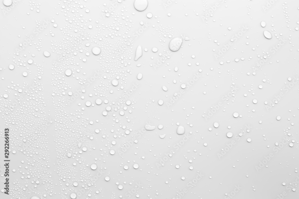 Water droplets on a gray background - obrazy, fototapety, plakaty 