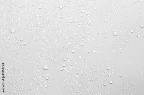 Water droplets on a gray background