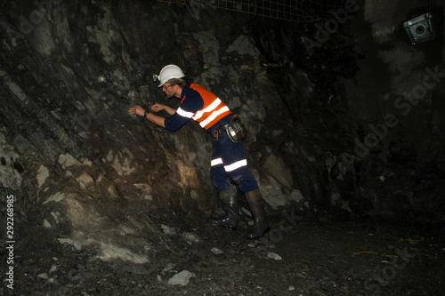 Underground Geologist in Mining Tunnel