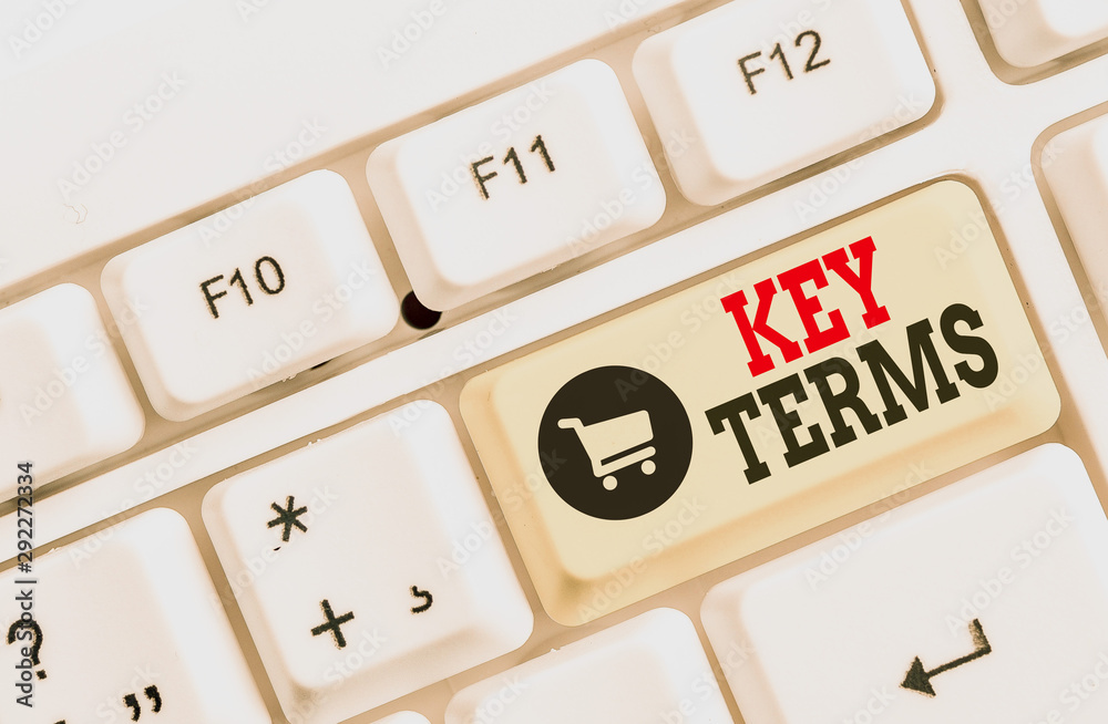 Text sign showing Key Terms. Business photo text Words that can help a demonstrating in searching information they need White pc keyboard with empty note paper above white background key copy space Text sign showing Key Terms. Business photo text Words that can help a demonstrating in searching information they need White pc keyboard with empty note paper above white background key copy space