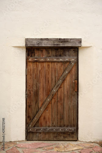 old wooden door in wall