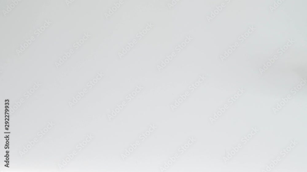 Holiday surprise. Special day present. Gift box sliding over white background.