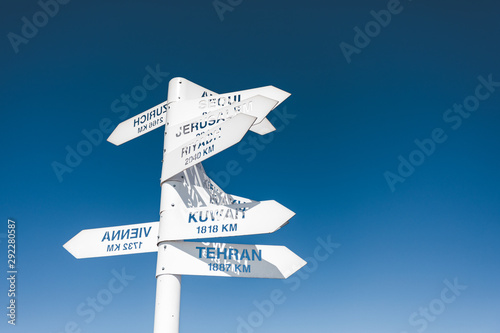 Destination signs to several famous cities  Tahtali  Kemer  Antalya  Turkey