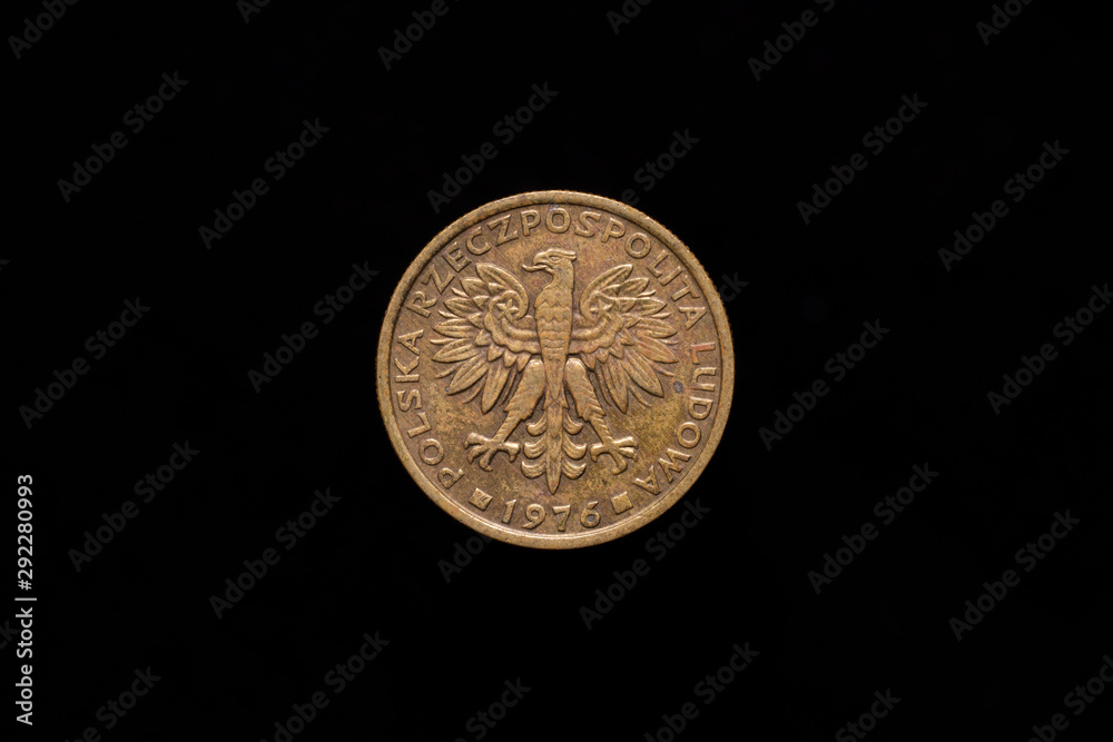 Polish People's Republic, Polska Rzeczpospolita Ludowa old 2 zloty, 2zl coin from 1976, obverse showing the coat of arms. Isolated on black background Polish People's Republic, Polska Rzeczpospolita Ludowa old 2 zloty, 2zl coin from 1976, obverse showing the coat of arms. Isolated on black background