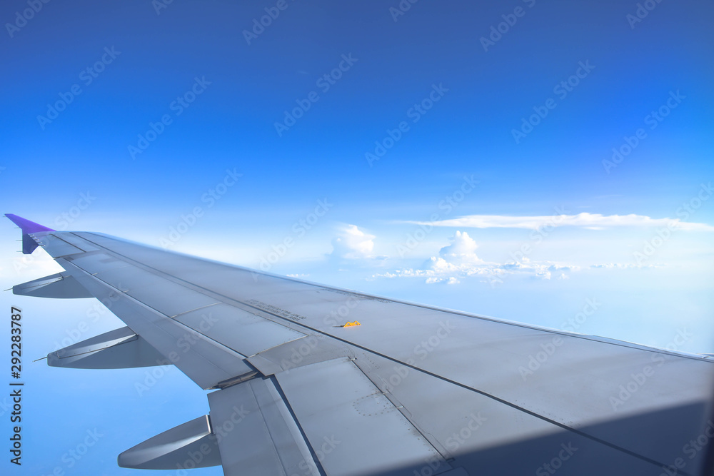 Airplane wing out of window Airplane wing out of window