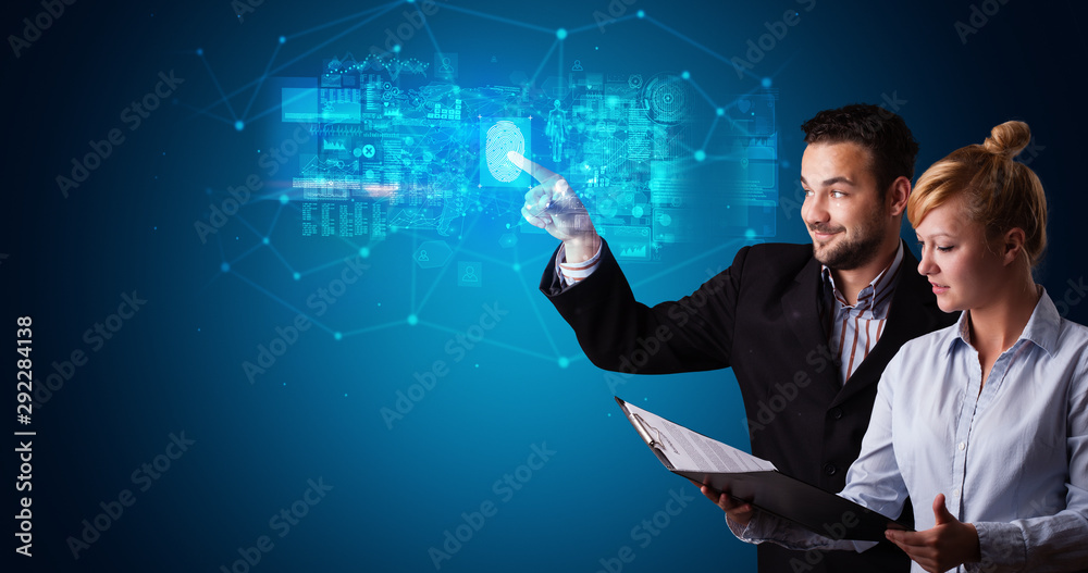 Man and woman accessing modern hologram personal database with fingerprint identification Man and woman accessing modern hologram personal database with fingerprint identification