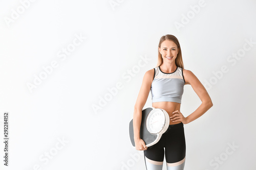 Beautiful sporty woman with...