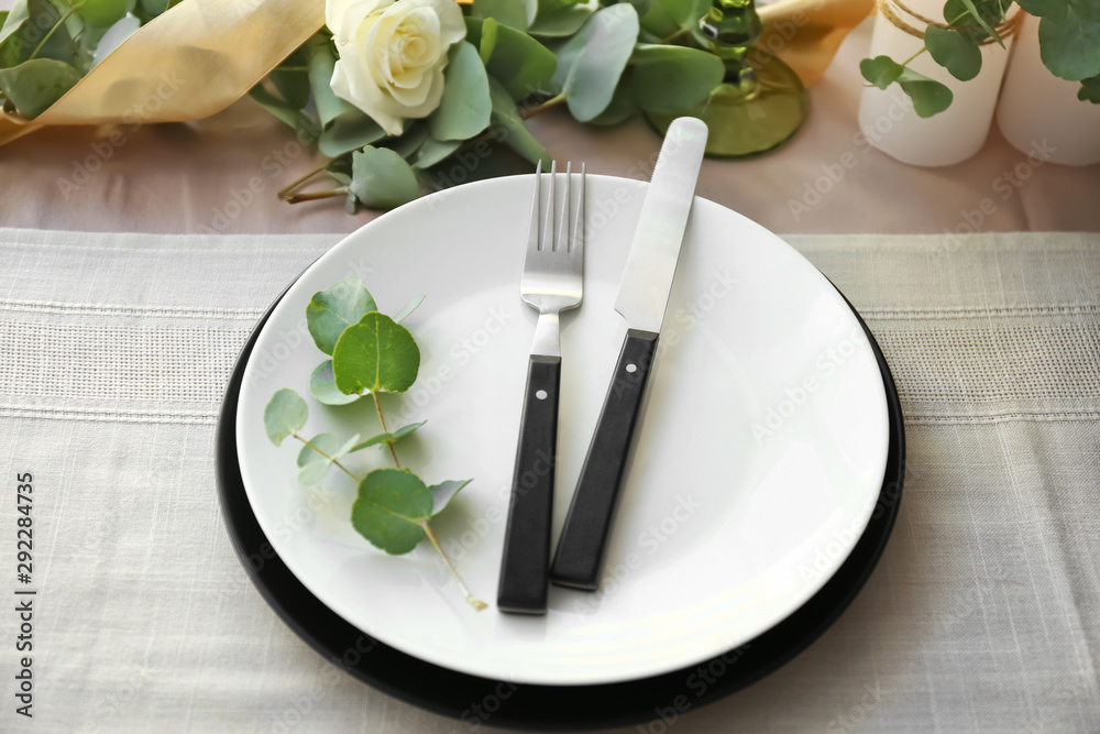 Beautiful table setting with floral decor Beautiful table setting with floral decor