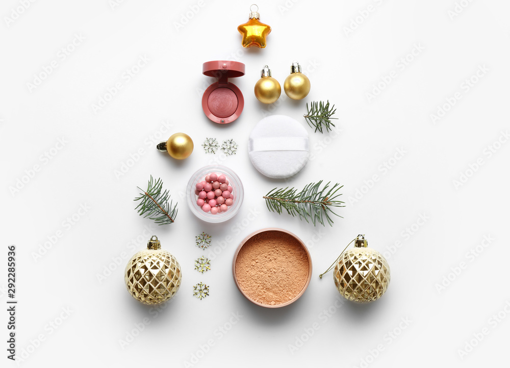Christmas composition with decorative cosmetics on white background - obrazy, fototapety, plakaty 