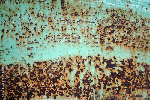 steel surface. An old weathered Green