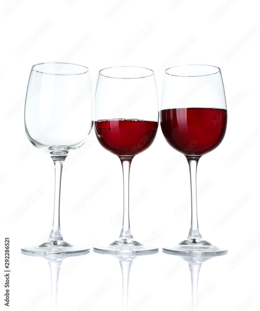 Glasses of wine on white background