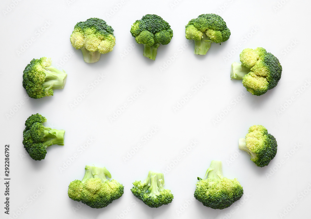 Frame made of fresh broccoli cabbage on white background Frame made of fresh broccoli cabbage on white background