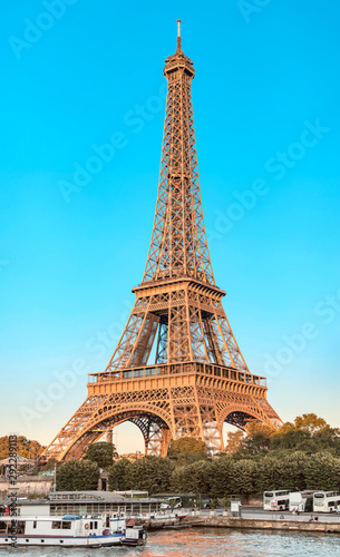 Panoramic view of Eiffel tower and Seine river at golden sunset. Travel landmarks in Europe and France