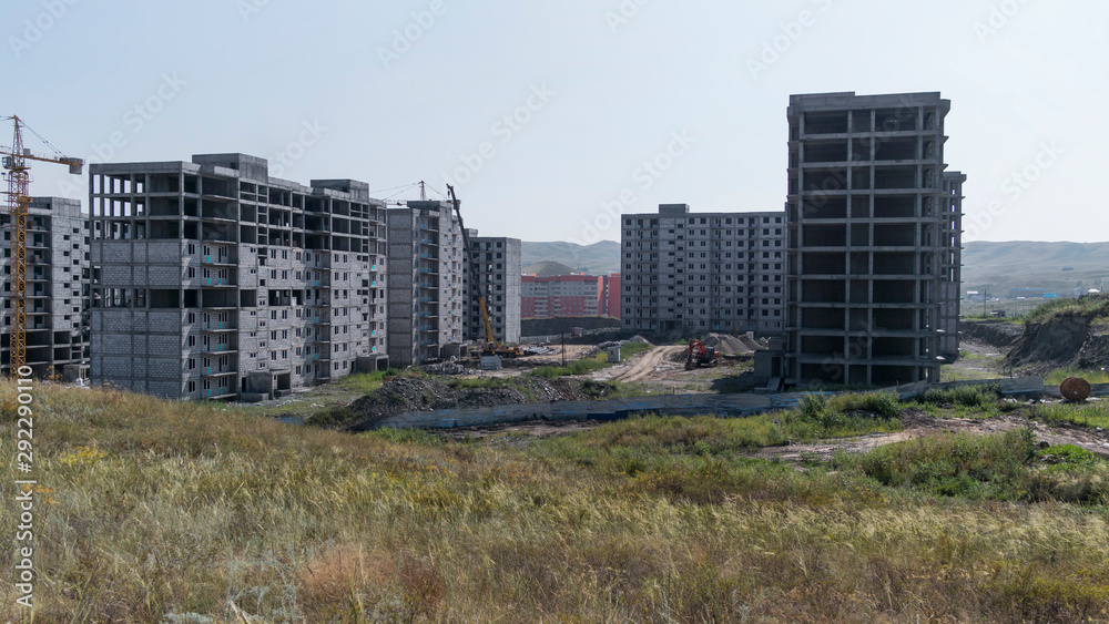 Building construction site. New building. Building is under construction.