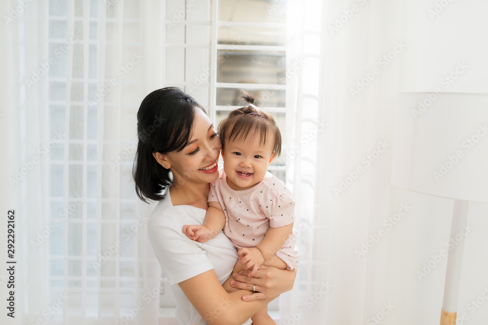 Happy Mother and daughter hugging Happy Mother and daughter hugging