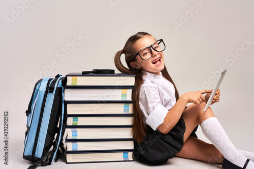Bild auf Leinwand Happy child studying with tablet