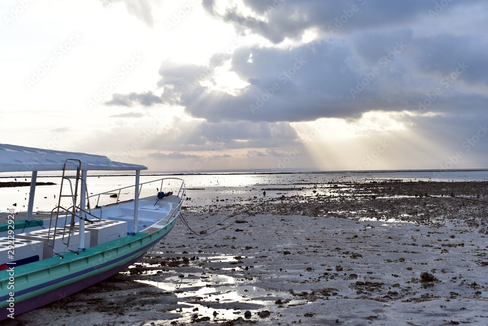Sunset and low tide at the east part of Nusa Lembongan Island, Bali, Indonesia