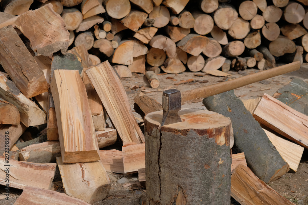 The process of chopping wood. how to chop or chop wood, solid fuel.