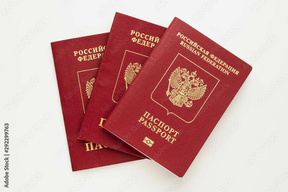 3 Russian passports on a white background. Isolated 3 Russian passports on a white background. Isolated