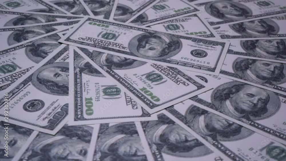 One Hundred dollar bills turning in a circle. Close Up Shot. One Hundred dollar bills turning in a circle. Close Up Shot.