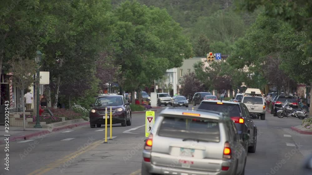 Cars driving through small tourist town in Colorado Cars driving through small tourist town in Colorado
