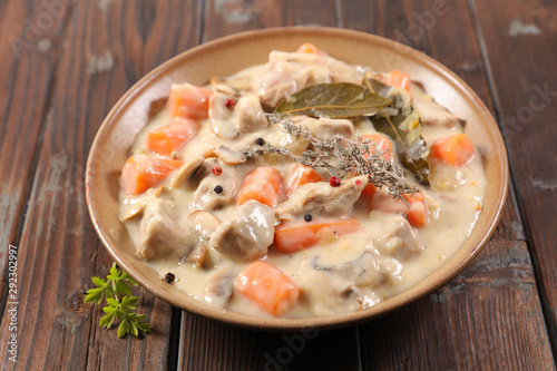blanquette de veau, french gastronomy- veal cooked with cream,carrot and herbs