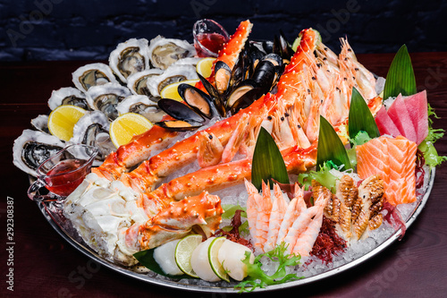 Seafood platter. Seafood on a large plate. Assorted seafood from mussels, oysters, crab, shrimp