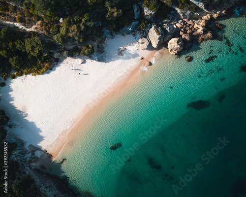 Aerial view of a tropical paradise beach with white sand and clear water in Nature Park Arrabida in Setubal, Portugal. photo