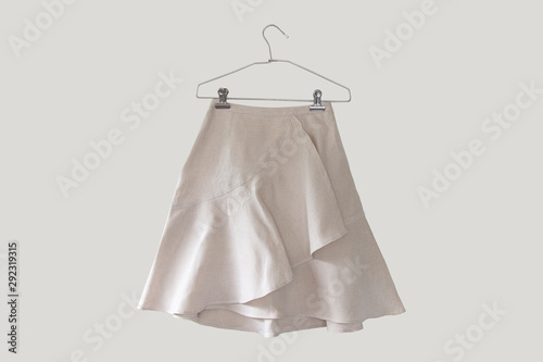 Fotografie ์Linen natural fabric Short magenta mini skirt on clean background
