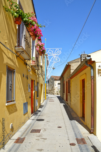 Brindisi di Montagna, a narrow street among the old houses of a mountain village in the Basilicata region.	