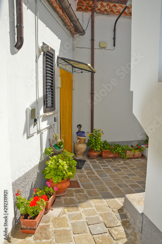 Brindisi di Montagna, a narrow street among the old houses of a mountain village in the Basilicata region. 