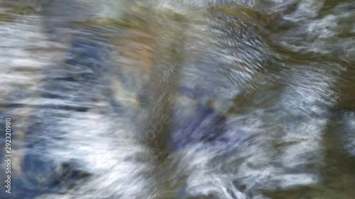 Flowing with the surface of the stream