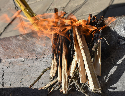 Firewood for kindling a fire. Fire kontra for a barbecue. photo